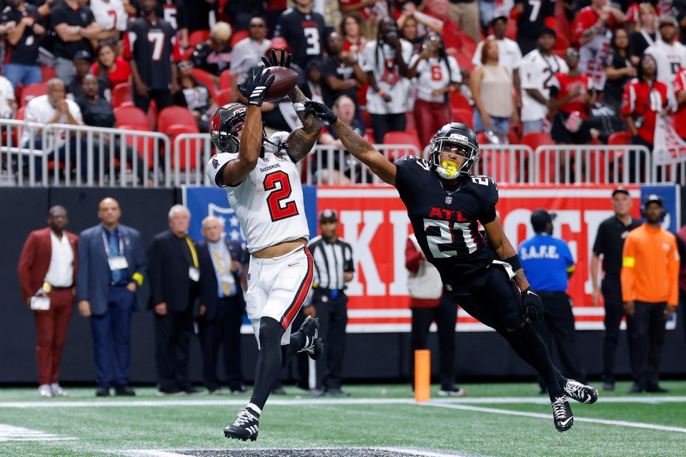 ATLANTA, GEORGIA - SEPTEMBER 07: Emeka Egbuka #2 of the Tampa Bay Buccaneers catches a touchdown pass against the Atlanta Falcons during the game at Mercedes-Benz Stadium on September 07, 2025 in Atlanta, Georgia. (Photo by Todd Kirkland/Getty Images)