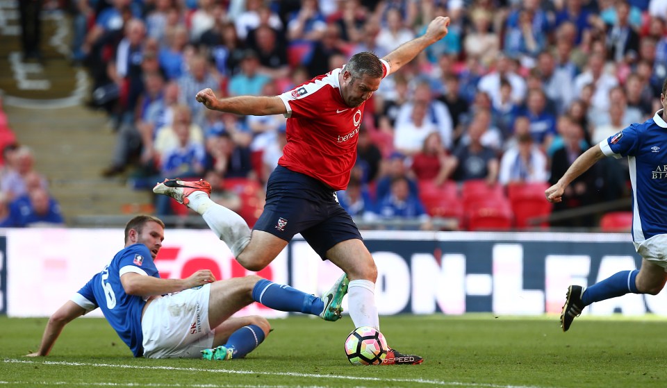 LONDON, ENGLAND - MAY 21:  Jon Parkin of York City prepares to shoot for goal to set up his sides third goal scored by Aiden Connolly during The Buildbase FA Trophy Final between York City and Macclesfield Town at Wembley Stadium on May 21, 2017 in London, England.  (Photo by Pete Norton/Getty Images)
