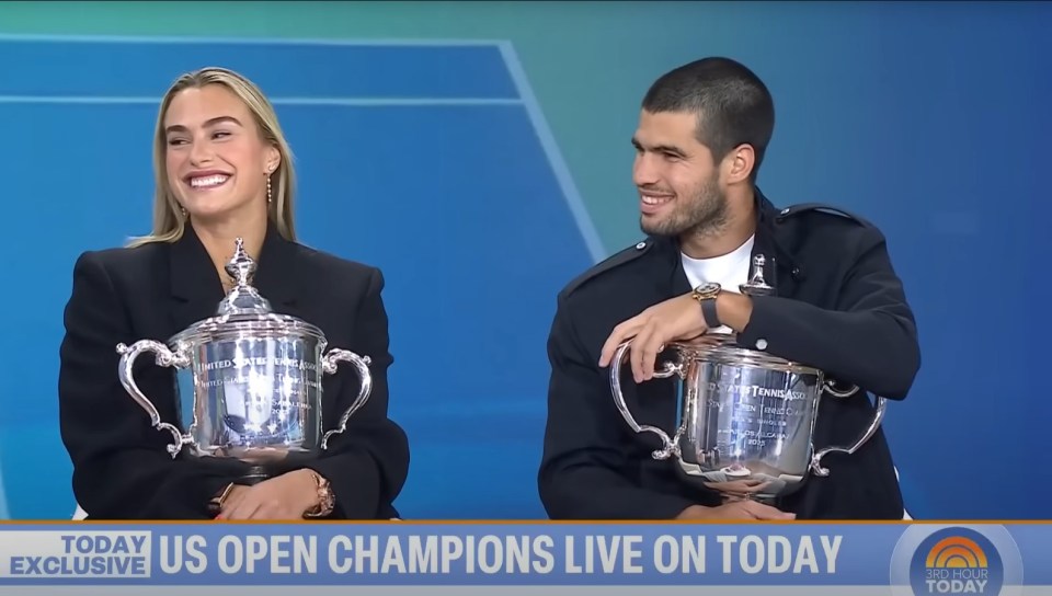 Sabalenka and Alcaraz proudly displayed their trophies during an interview